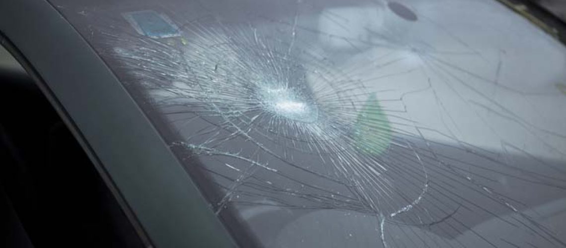 Close-up of a broken windshield